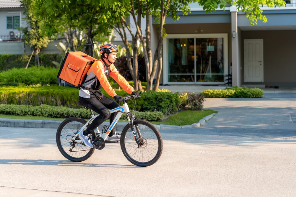 A delivery agent on a bike